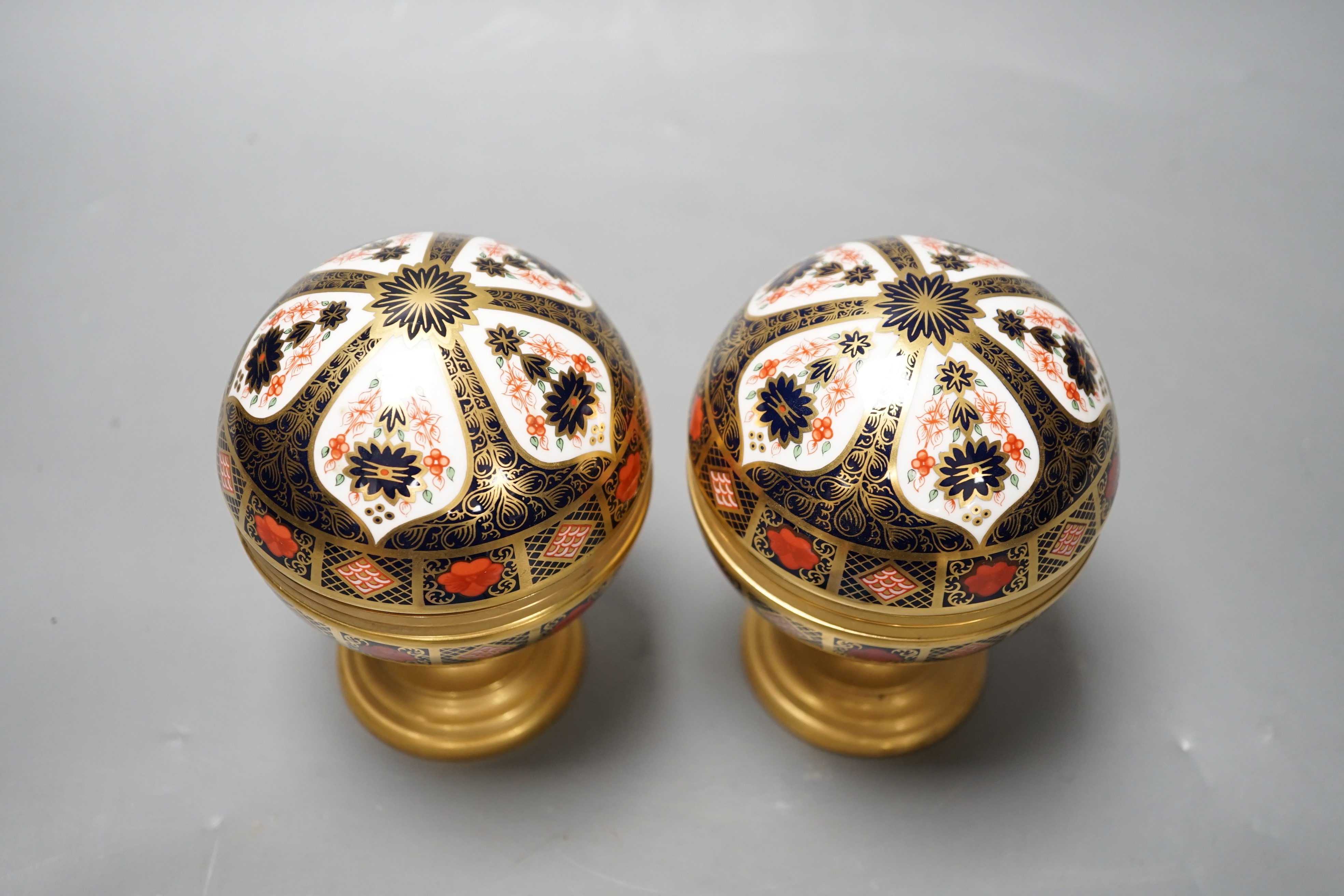 A Royal Crown Derby Millennium globe thermometer and a Millennium globe aneroid barometer, 13cms high